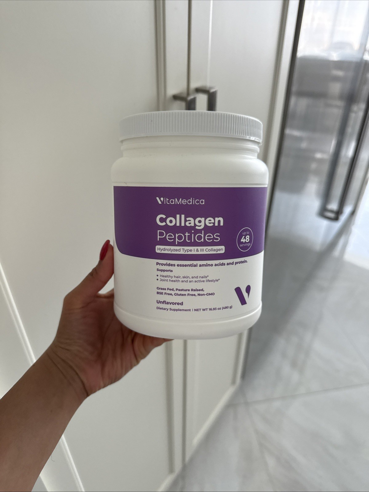 VitaMedica Collagen Peptides Powder OPEN container. More than half full